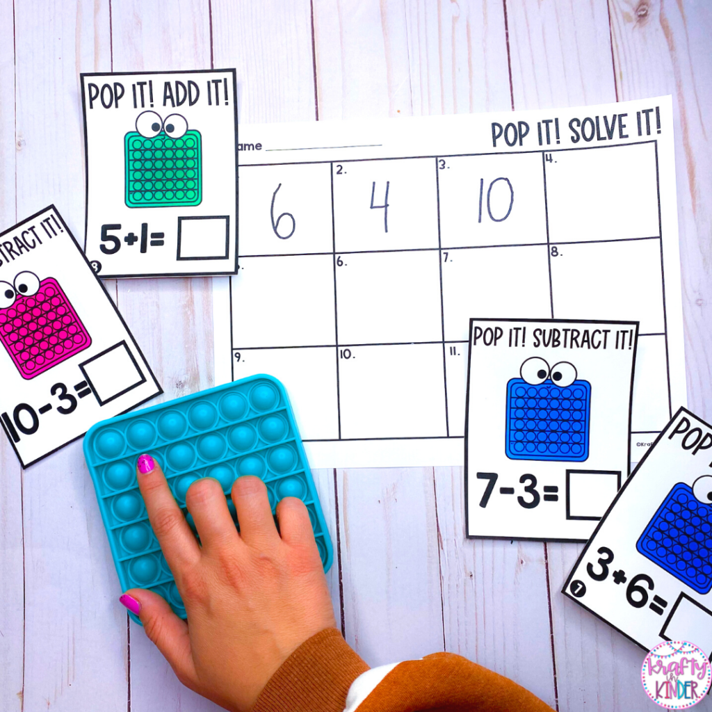 Using Pop Its in the classroom to help students solve math problems using task cards like these.