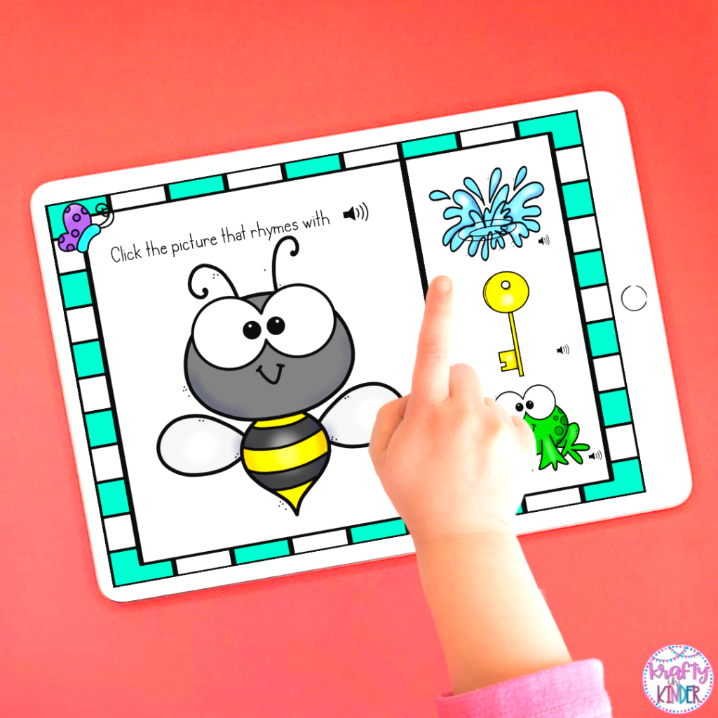 Child using a tablet to complete digital rhyming activities.