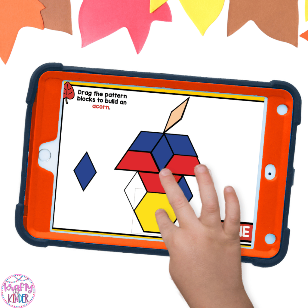 With the fall math games in this image, students can move digital pattern blocks to create fun fall shapes like an acorn.